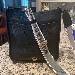 Black Michael Kors crossbody bag.